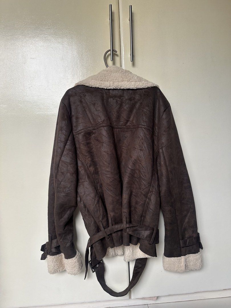 GYDA Brown Faux Fur Lined Aviator Jacket (Category: Coats, Jackets and Outerwear) located in Manila. Submitted by loved_ag (Listing ID 1443553168, Image 2). Description: - Brown aviator jacket from GYDA - Cozy faux fur lining on collar and cuffs - Stylish belt detail at the waist - Buckle accents on collar and sleeves - Super warm and fashionable - Ideal for cooler weather.