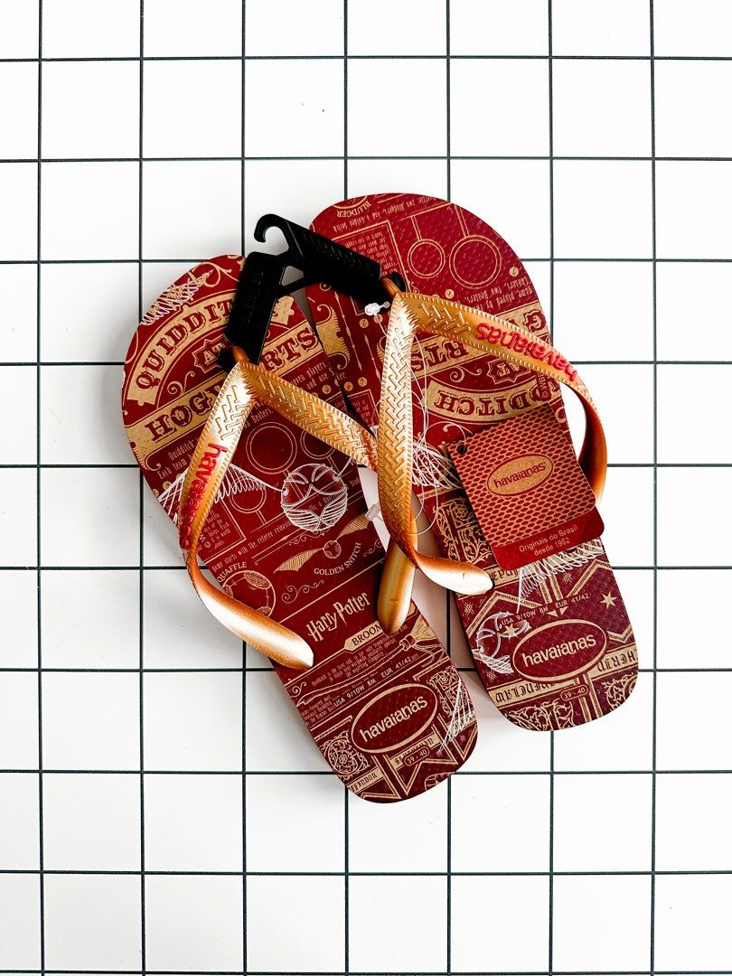 Havaianas Harry Potter Golden Snitch Flip Flops (Category: Slippers and slides) located in Makati City. Submitted by larkvain (Listing ID 1443553562, Image 1). Description: Description: - Havaianas Flip Flops - Harry Potter Theme - Features Golden Snitch and Hogwarts crest - Shimmery gold straps - Red soles - Size: EUR 39-40 US9/10W - Ideal for Harry Potter fans.