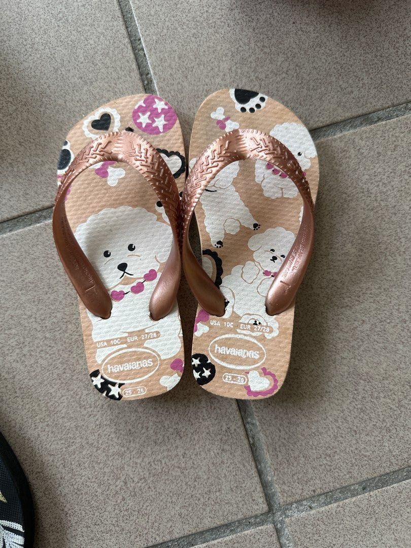 Havaianas Kids Flip Flops Dog Print Rose Gold (Category: Babies & Kids Fashion) located in Singapore. Submitted by rksy18 (Listing ID 1443610433, Image 1). Description: - Cute Havaianas flip flops for kids - Fun all-over dog print - Rose gold straps - Soles show some wear, but plenty of life remaining .