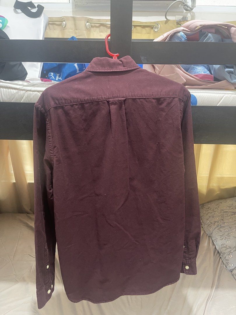 H&M Long Sleeve Button Down Shirt Burgundy (Category: Formal Shirts) located in Imus. Submitted by dffabellon (Listing ID 1442482685, Image 3). Description: - Burgundy long sleeve shirt from H&M - Button-down style with collar - Single chest pocket - Versatile for casual or smart casual outfits - Pairs well with jeans or chinos.