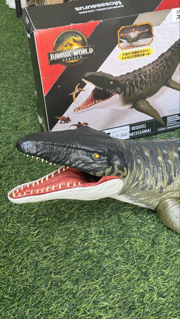 Jurassic World Super Colossal Mosasaurus Toy (Category: Action & Battle Toys) located in Valenzuela. Submitted by lestermnl (Listing ID 1443676153, Image 2). Description: - Super Big Jurassic World Mosasaurus toy - Super Colossal version - Comes with original box - Great for any dinosaur fan - Impressive size (check box for dimensions) - Ready for its new owner ₱5,999 only Good as new condition RFS: Decluttering .