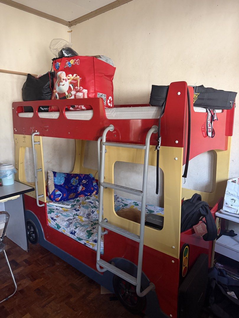 Kids Fire Truck Bunk Bed with Ladder (Category: Bed Frames & Mattresses) located in Cainta. Submitted by jtc23 (Listing ID 1443662056, Image 3). Description: - Fun fire truck themed bunk bed for kids - Vibrant red and yellow design - Includes a ladder for easy access to the top bunk - Mattresses are included - Perfect addition to a child's bedroom -selling as is -check photos for scratches and tear .