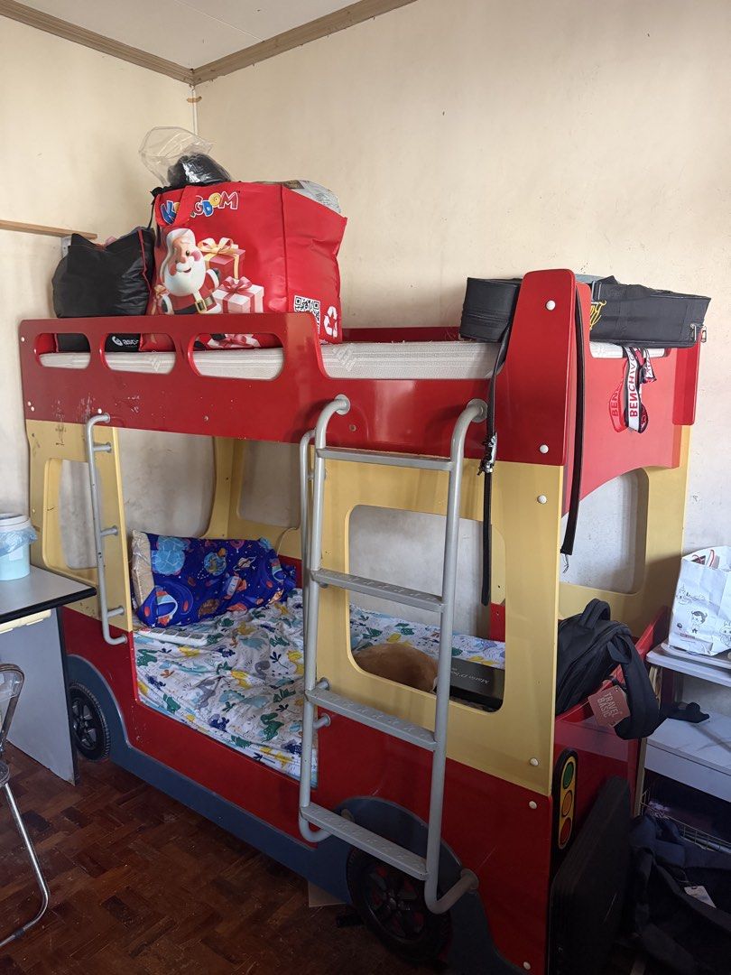 Kids Fire Truck Bunk Bed with Ladder (Category: Bed Frames & Mattresses) located in Cainta. Submitted by jtc23 (Listing ID 1443662056, Image 2). Description: - Fun fire truck themed bunk bed for kids - Vibrant red and yellow design - Includes a ladder for easy access to the top bunk - Mattresses are included - Perfect addition to a child's bedroom -selling as is -check photos for scratches and tear .