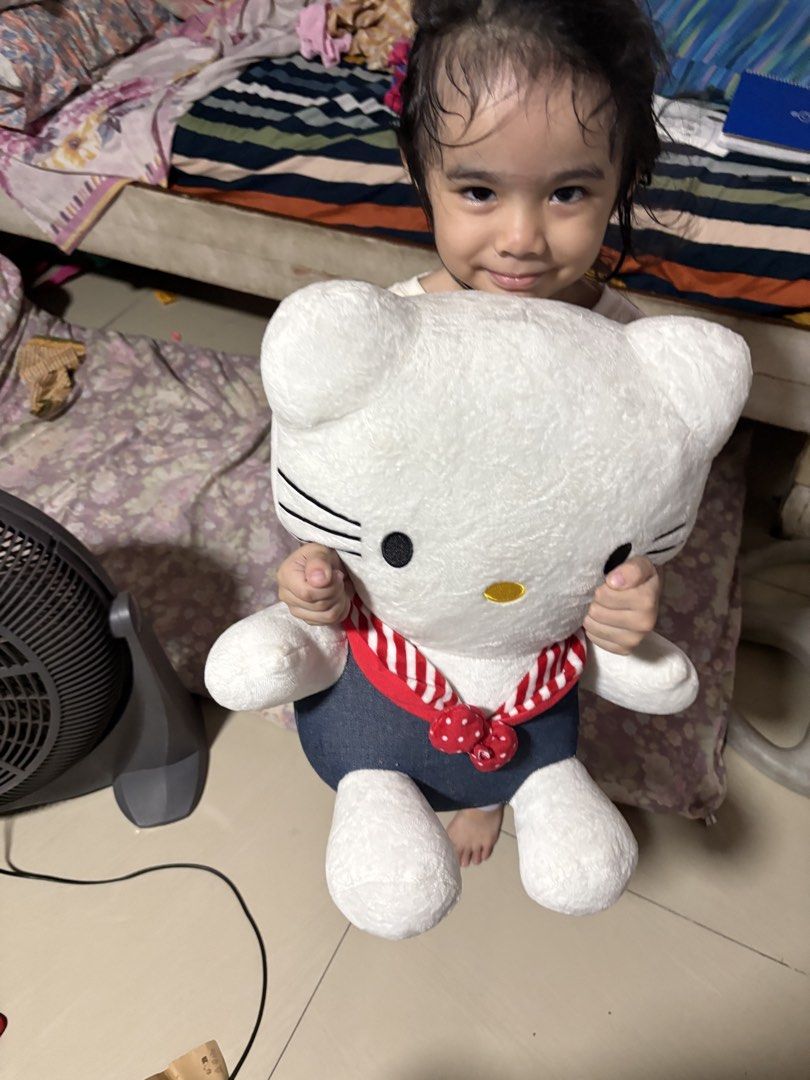 Large Hello Kitty Plush Toy with Denim Overalls (Category: Plushies & Soft Toys) located in Manila. Submitted by crisdancal (Listing ID 1443593082, Image 3). Description: - Adorable and soft Kitty plush toy. - Features cute denim overalls. - Adorned with a red and white polka dot bow. - Ideal size for hugging or showcasing. - A must-have for any Kitty enthusiast. - Clean and ready for its new owner..