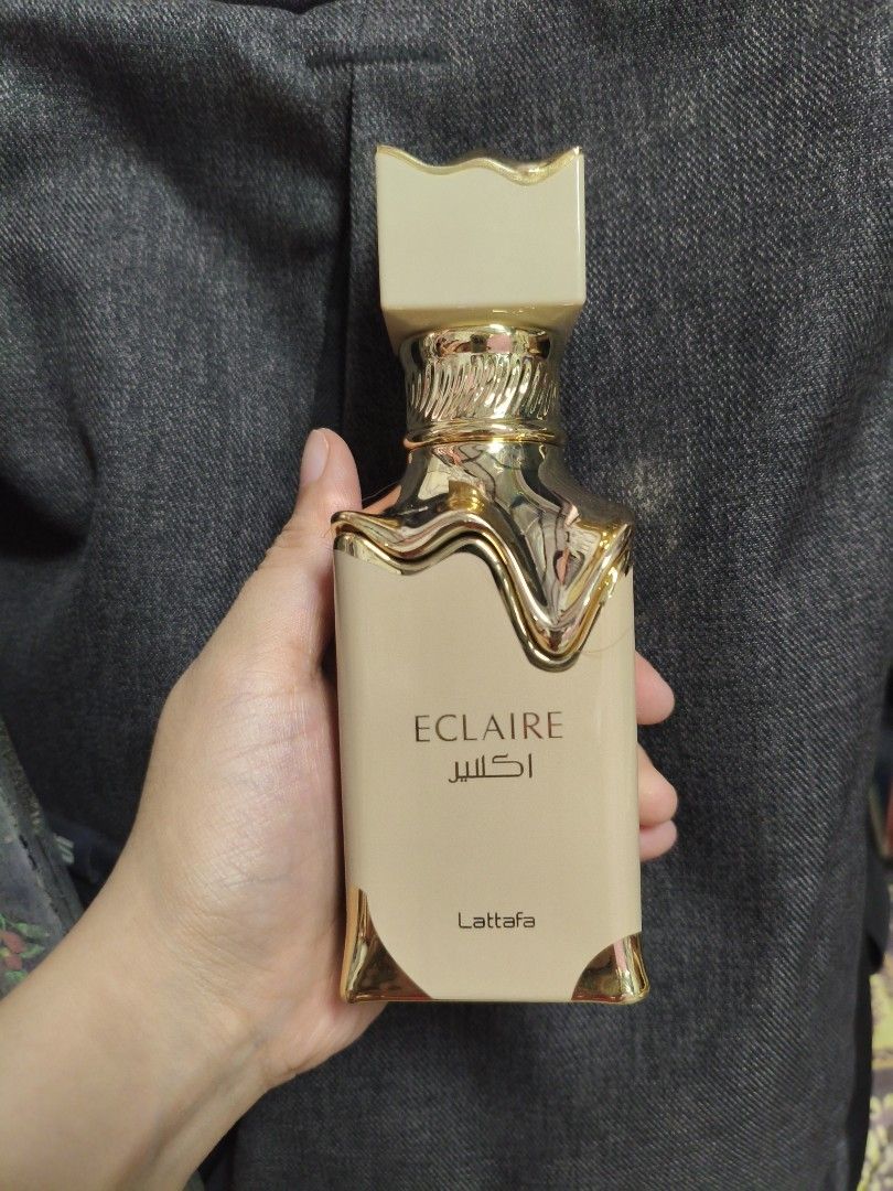 Lattafa Eclaire Eau de Parfum for Women (Category: Fragrance & Deodorants) located in Quezon City. Submitted by cathian (Listing ID 1443608823, Image 1). Description: New arrival. - Brand: Lattafa - Fragrance Name: Eclaire - Bottle Color: Beige with gold accents - Cap Design: Unique crown-like - Condition: Full bottle - Scent Profile: Great for everyday wear.
