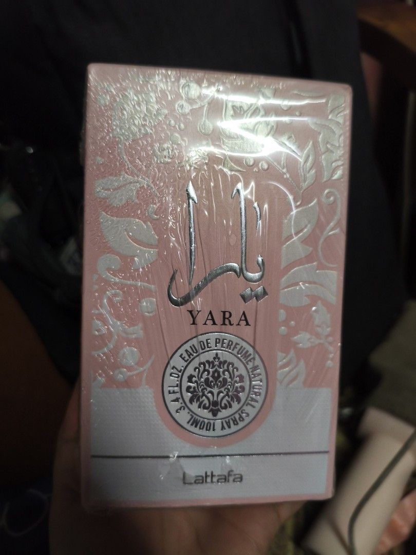Lattafa Yara Eau de Parfum Spray 100ml (Category: Fragrance & Deodorants) located in Quezon City. Submitted by cathian (Listing ID 1443614023, Image 3). Description: - Lattafa Yara Eau de Parfum - 100ml spray bottle - Elegant pink bottle with silver accents - Comes in original packaging - Ideal for everyday wear.