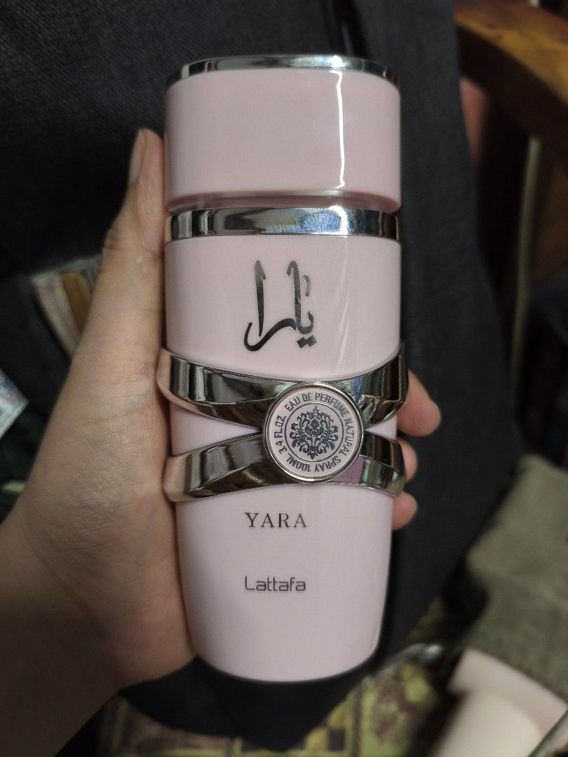 Lattafa Yara Eau de Parfum Spray 100ml (Category: Fragrance & Deodorants) located in Quezon City. Submitted by cathian (Listing ID 1443614023, Image 1). Description: - Lattafa Yara Eau de Parfum - 100ml spray bottle - Elegant pink bottle with silver accents - Comes in original packaging - Ideal for everyday wear.