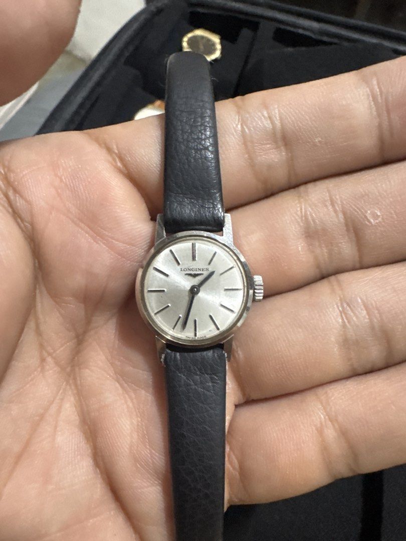 Longines Silver Dial Leather Strap Watch (Category: Luxury Watches) located in Quezon City. Submitted by wildcloud. (Listing ID 1443605183, Image 2). Description: - Vintage Longines watch - Silver dial with simple markers - Black leather strap - In excellent working condition - Perfect for everyday wear or watch collectors.