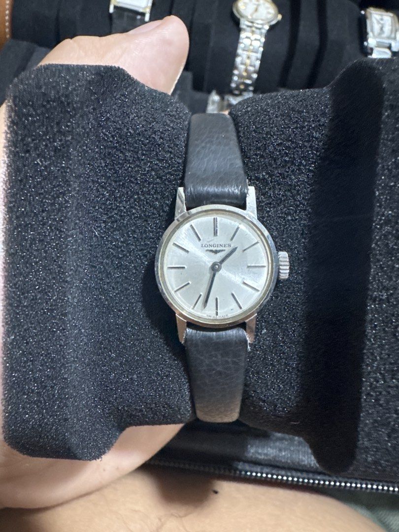 Longines Silver Dial Leather Strap Watch (Category: Luxury Watches) located in Quezon City. Submitted by wildcloud. (Listing ID 1443605183, Image 1). Description: - Vintage Longines watch - Silver dial with simple markers - Black leather strap - In excellent working condition - Perfect for everyday wear or watch collectors.