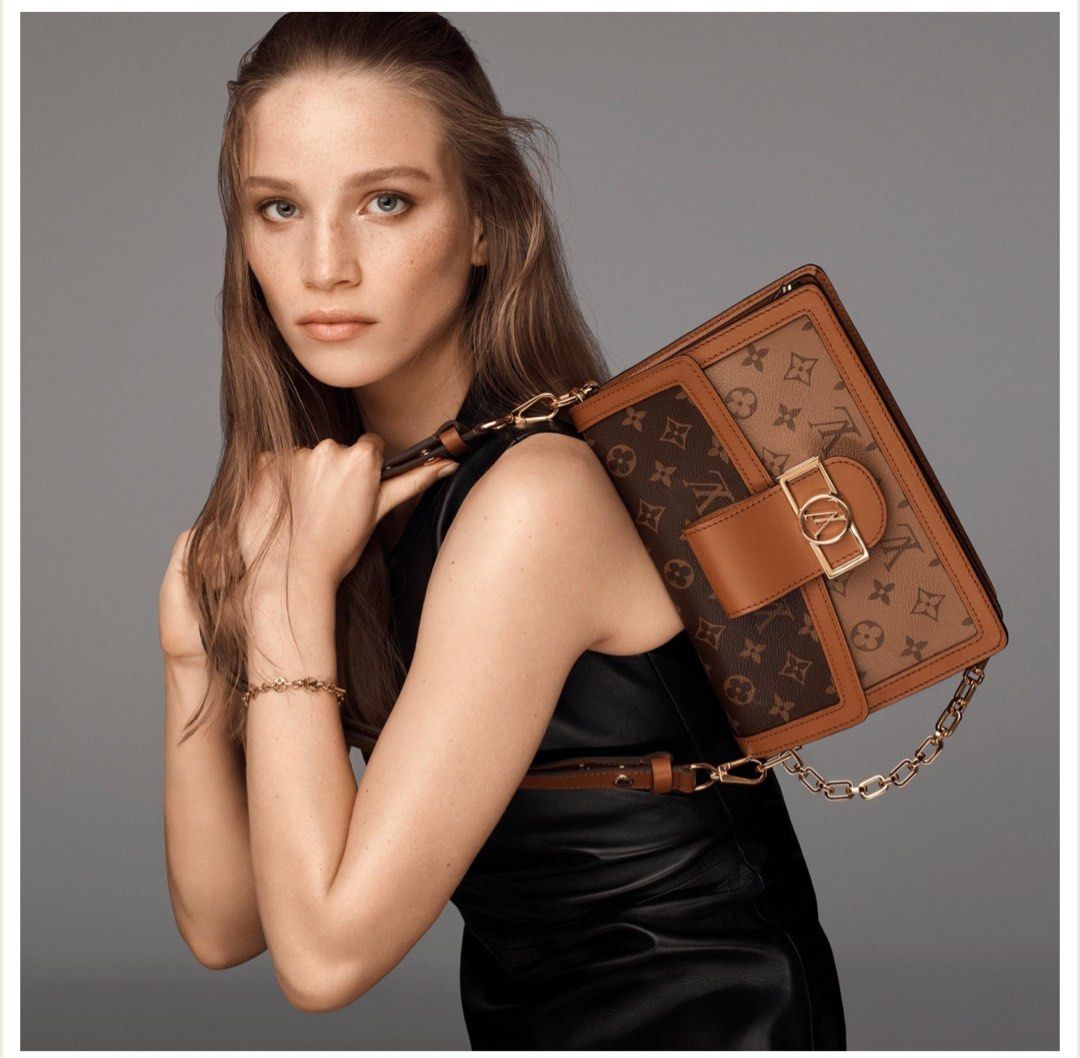 LV Dauphine MM (microchipped) (Category: Luxury Bags & Wallets) located in Manila. Submitted by sa.edit (Listing ID 1440299451, Image 3). Description: LV Dauphine MM (microchipped) Made in Spain Materials: Monogram and Monogram Reverse coated canvas, Cowhide-leather trim, Microfiber lining, Gold-color hardware, Magnetized front lock Measurements: ‭25 x 17 x 10.5‬ cm Inclusions: Leather strap, chain, dustbag, box, store receipt, entrupy certificat