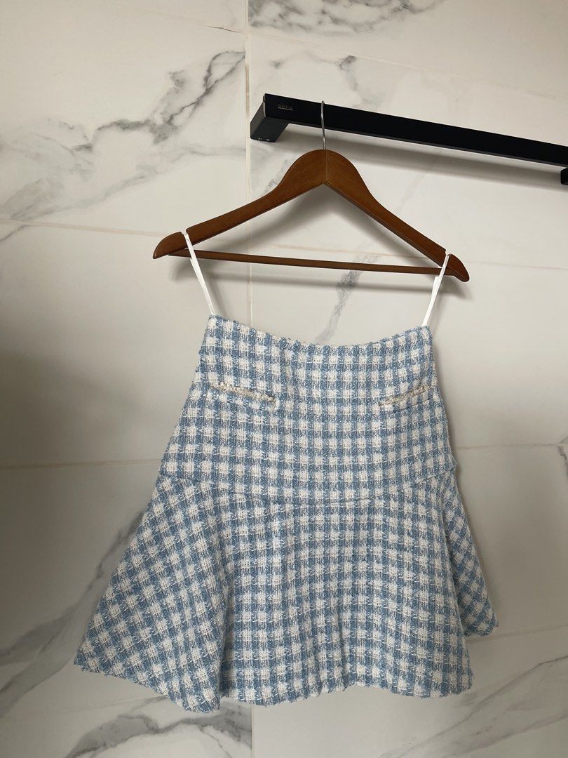 Mango Blue and White Checkered Tweed Skirt - S (Category: Skirts) located in Angeles City. Submitted by svrn_declutter (Listing ID 1443549365, Image 1). Description: Mango Blue Checkered Tweed Skirt - S - worn once/twice - seamlessly zippered by the side - tweed textured fabric - pockets are only for design, slight gold detail on the fabric - Waist: 26 in | Length: 17.5 in (measured manually) - rfs: decluttering - mop: gcash only.