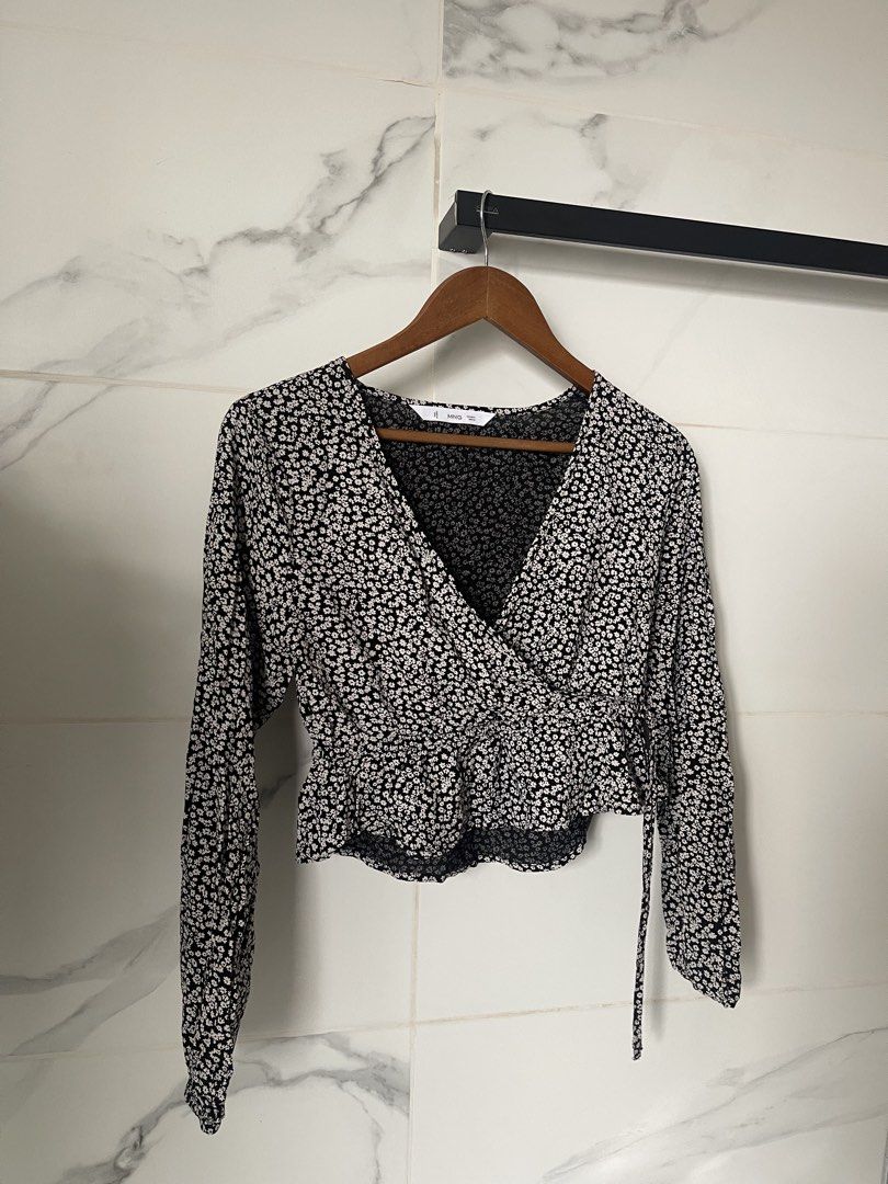 Mango Wrap Floral Blouse Long Sleeve Black - S (Category: Blouses) located in Angeles City. Submitted by svrn_declutter (Listing ID 1443544981, Image 1). Description: Mango Wrap Floral Blouse Longsleeve - EU S - worn twice - garterized by the cuffs and at the waist as a slight peplum - viscose material - Waist: 28-30 in | Length: 17 in (measured manually) - rfs: decluttering - mop: gcash only.