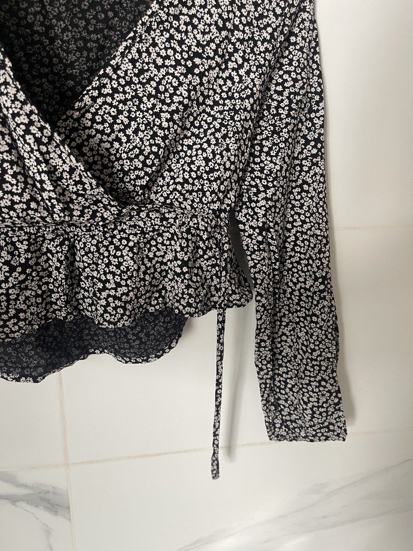 Mango Wrap Floral Blouse Long Sleeve Black - S (Category: Blouses) located in Angeles City. Submitted by svrn_declutter (Listing ID 1443544981, Image 3). Description: Mango Wrap Floral Blouse Longsleeve - EU S - worn twice - garterized by the cuffs and at the waist as a slight peplum - viscose material - Waist: 28-30 in | Length: 17 in (measured manually) - rfs: decluttering - mop: gcash only.