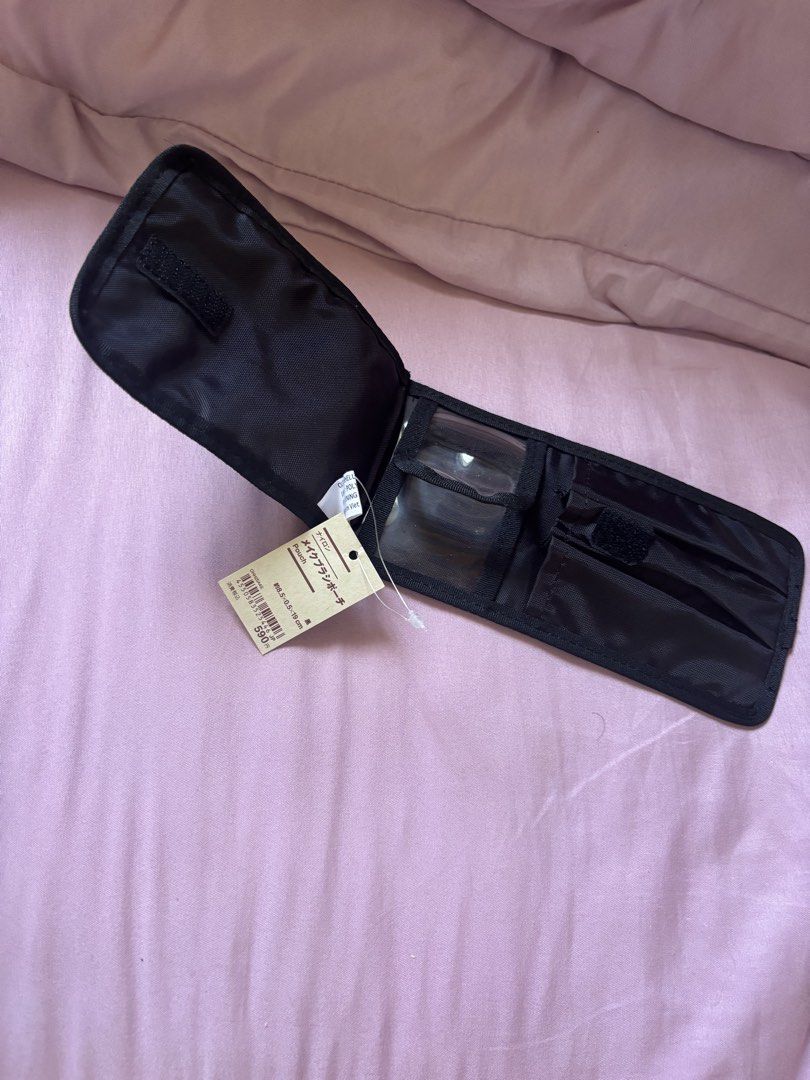 Muji Black Makeup Brush Holder Pouch (Category: Makeup) located in Binan City. Submitted by kpreloved___ (Listing ID 1443504854, Image 2). Description: - Black makeup brush holder - Folds open to reveal clear compartments - Secure velcro closures - Fits brushes up to 19cm - Ideal for on-the-go makeup organization - Compact and practical design bought in Japan.