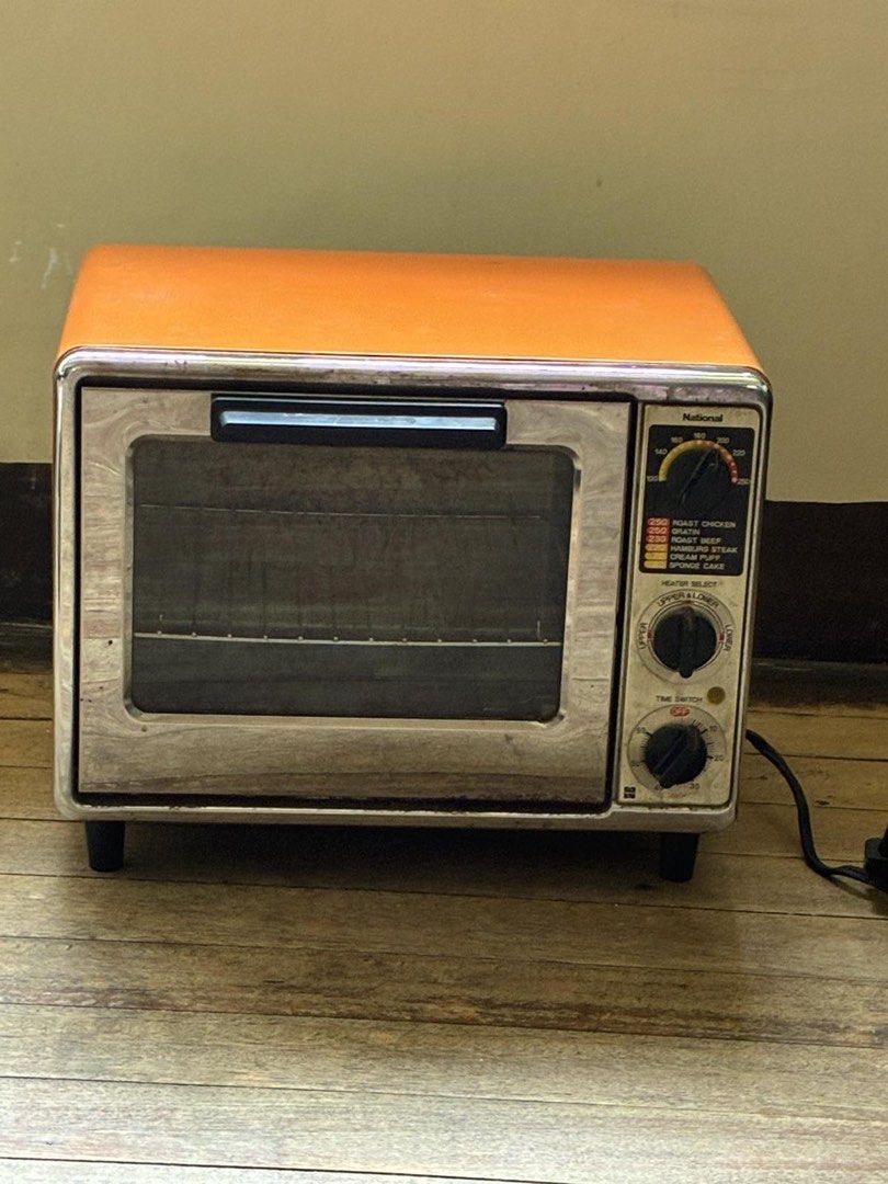 National Orange Retro Toaster Oven (Category: Ovens & Toasters) located in Quezon City. Submitted by erlinda_ivy (Listing ID 1443567945, Image 2). Description: - National toaster oven in a vibrant orange color Old and used - Dimension: 15.5inch x 10.25inch - Features settings for roasting chicken, roast beef, and other dishes. - Comes with a convenient crumb tray. - Functional and ready to add retro charm to your kitchen..