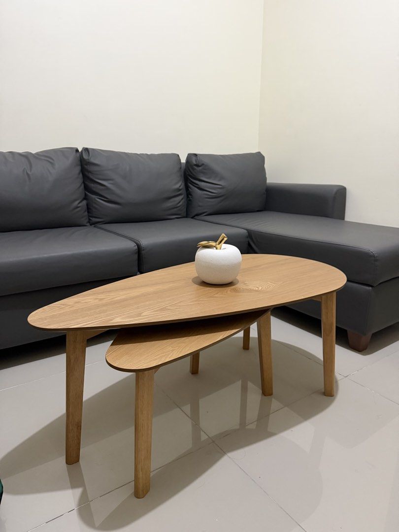 Nesting Coffee Table Set - Oak Wood Finish and Decor (Category: Tables & Sets) located in Manila. Submitted by eyngel9657 (Listing ID 1443663782, Image 1). Description: Set of 2 teardrop coffee tables with decor Bought last June 5,2026 and used for a week or two.
