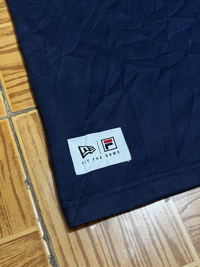New era x Fila (Category: Tshirts & Polo Shirts ) located in Talisay. Submitted by arabell21 (Listing ID 1443554619, Image 3). Description: Good as new condition Size medium on tag Best fit XL-XXL Dimes W25 L32 Color rate 10/10 No issue.