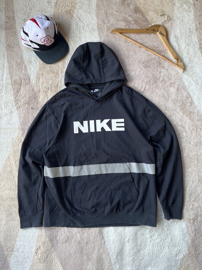 Nike Black Hoodie with Large Logo (Category: Hoodies) located in Baler. Submitted by shneyy (Listing ID 1443580075, Image 1). Description: Demis: 25x28 - Reflective stripe detail Good condition .
