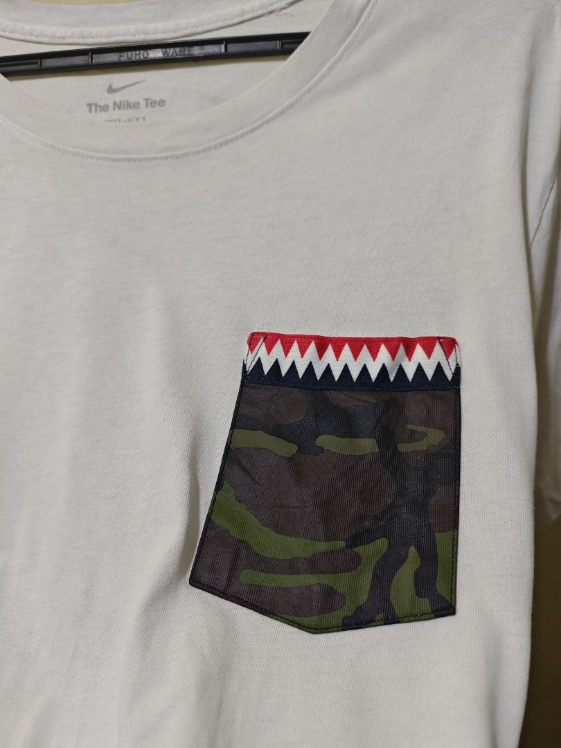 Nike Camo Shark Graphic Men Tshirt (Category: Tshirts & Polo Shirts ) located in Baguio. Submitted by cool_chic (Listing ID 1443649347, Image 3). Description: Nike Camo Shark Men Tshirt Color Rate 9.5/10 No Flaws Complete Tags Cotton Tela Machine Washed Size XL Dimes 22 Width 29 Length Price P259.