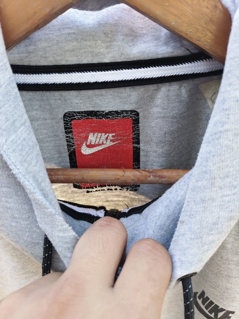 Nike Tech Fleece Full Zip Hoodie Grey (Category: Coats, Jackets and Outerwear) located in Manila. Submitted by de_uno1 (Listing ID 1443604817, Image 2). Description: - Grey Nike Tech Fleece hoodie - Full zip closure with black accents - Two front pockets - Size: L - Made in China - Ideal for everyday wear or workouts.