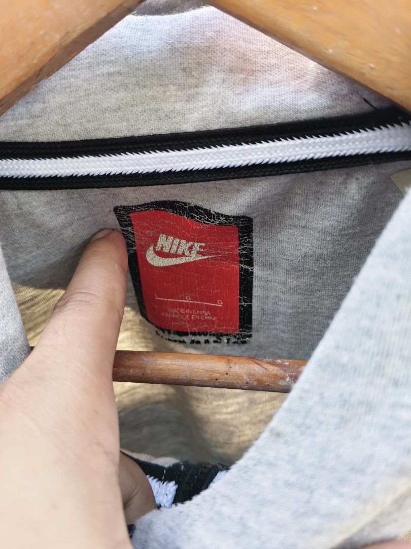 Nike Tech Fleece Full Zip Hoodie Grey (Category: Coats, Jackets and Outerwear) located in Manila. Submitted by de_uno1 (Listing ID 1443604817, Image 3). Description: - Grey Nike Tech Fleece hoodie - Full zip closure with black accents - Two front pockets - Size: L - Made in China - Ideal for everyday wear or workouts.
