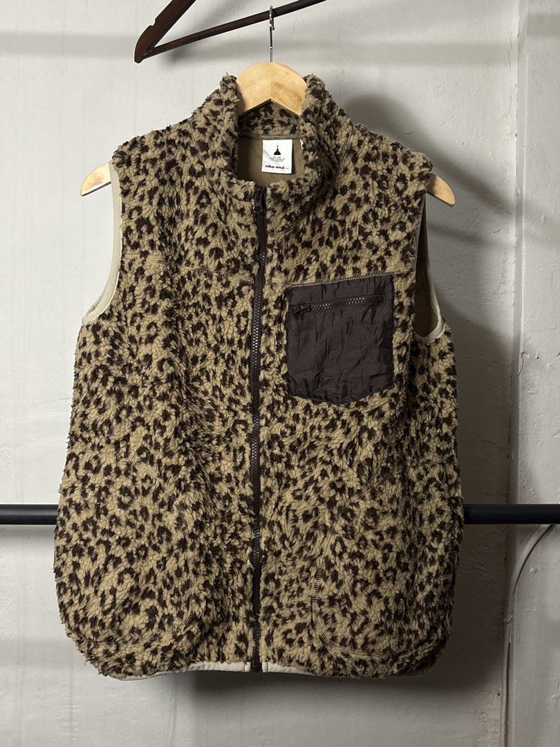 Niko and... Leopard Print Fleece Vest (Category: Vests) located in Manila. Submitted by angelll444 (Listing ID 1443655736, Image 1). Description: - 21x26 Medium - Super cozy leopard print fleece vest from Niko and... - Soft and fluffy material for ultimate comfort. - Features a zip-up front for easy wear. - Includes a chest pocket with a zip closure for secure storage. - Ideal for layering during cooler weather. - Effortlessly style for a casual 