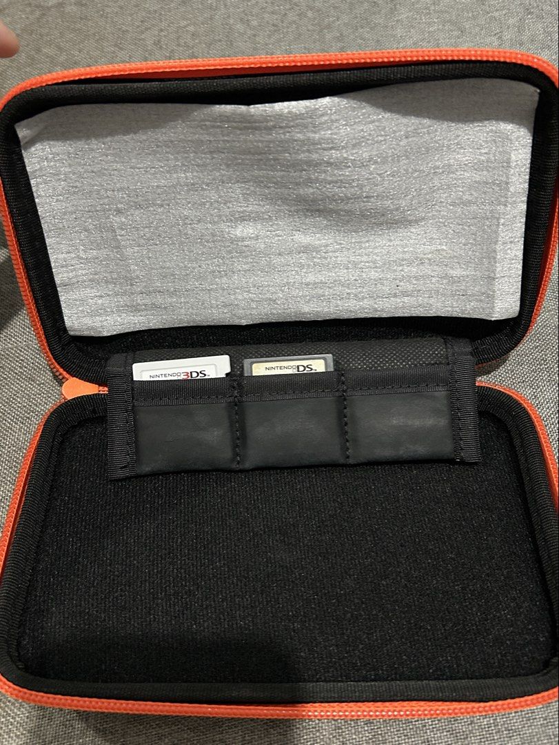 Nintendo 2DS/3DS Case (Category: Nintendo) located in Manila. Submitted by h07wh3els (Listing ID 1443557932, Image 3). Description: - good as new, punasan lang outside ☺️ - case only. games not included - original.