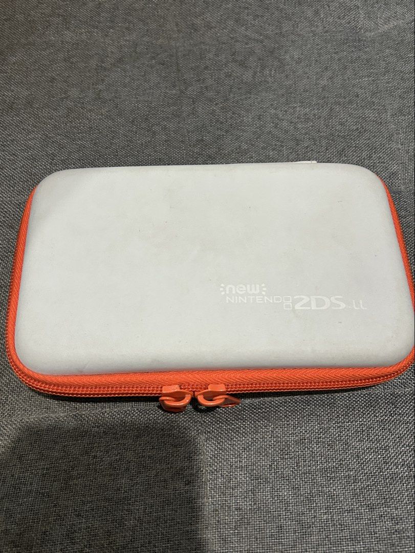 Nintendo 2DS/3DS Case (Category: Nintendo) located in Manila. Submitted by h07wh3els (Listing ID 1443557932, Image 1). Description: - good as new, punasan lang outside ☺️ - case only. games not included - original.