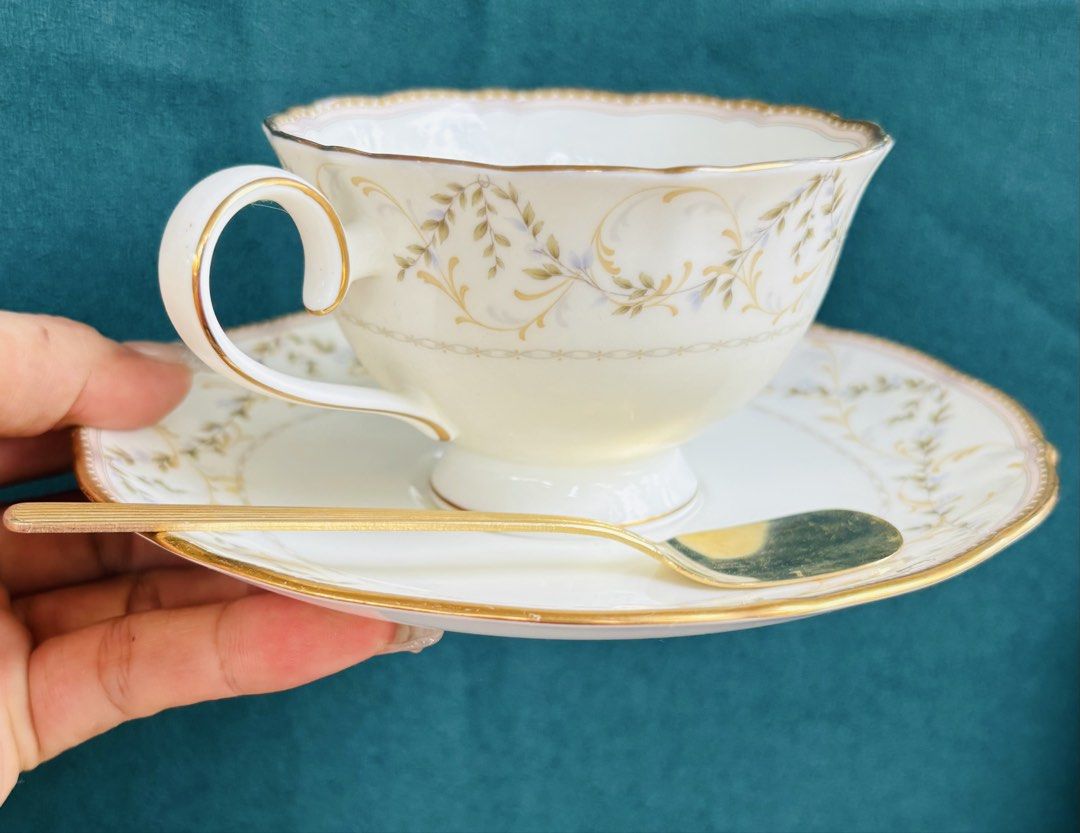 Noritake tea cup and saucer (Category: Coffee & Tea Tableware) located in Dapitan. Submitted by clarisasan19348 (Listing ID 1443500147, Image 2). Description: Used stirrer.