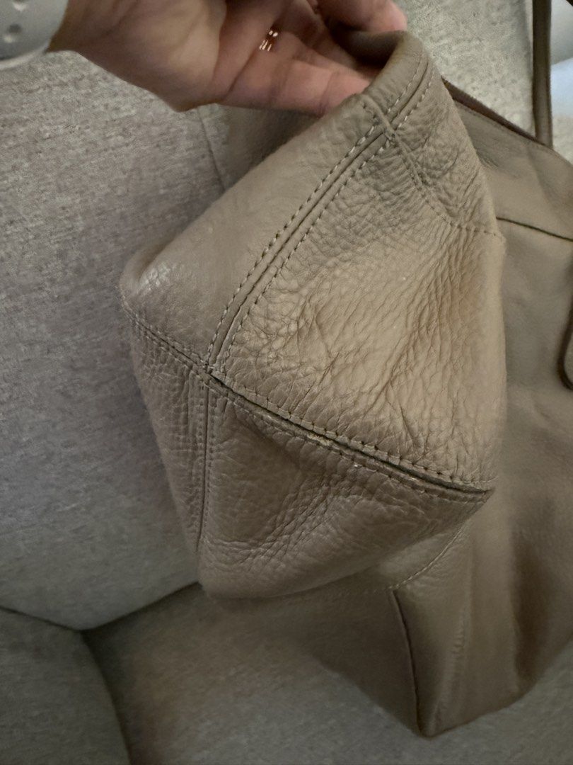 Our Tribe Bag (Category: Tote Bags) located in Taguig. Submitted by jeimso (Listing ID 1443523698, Image 3). Description: Like new Genuine Leather Very nice in actual .