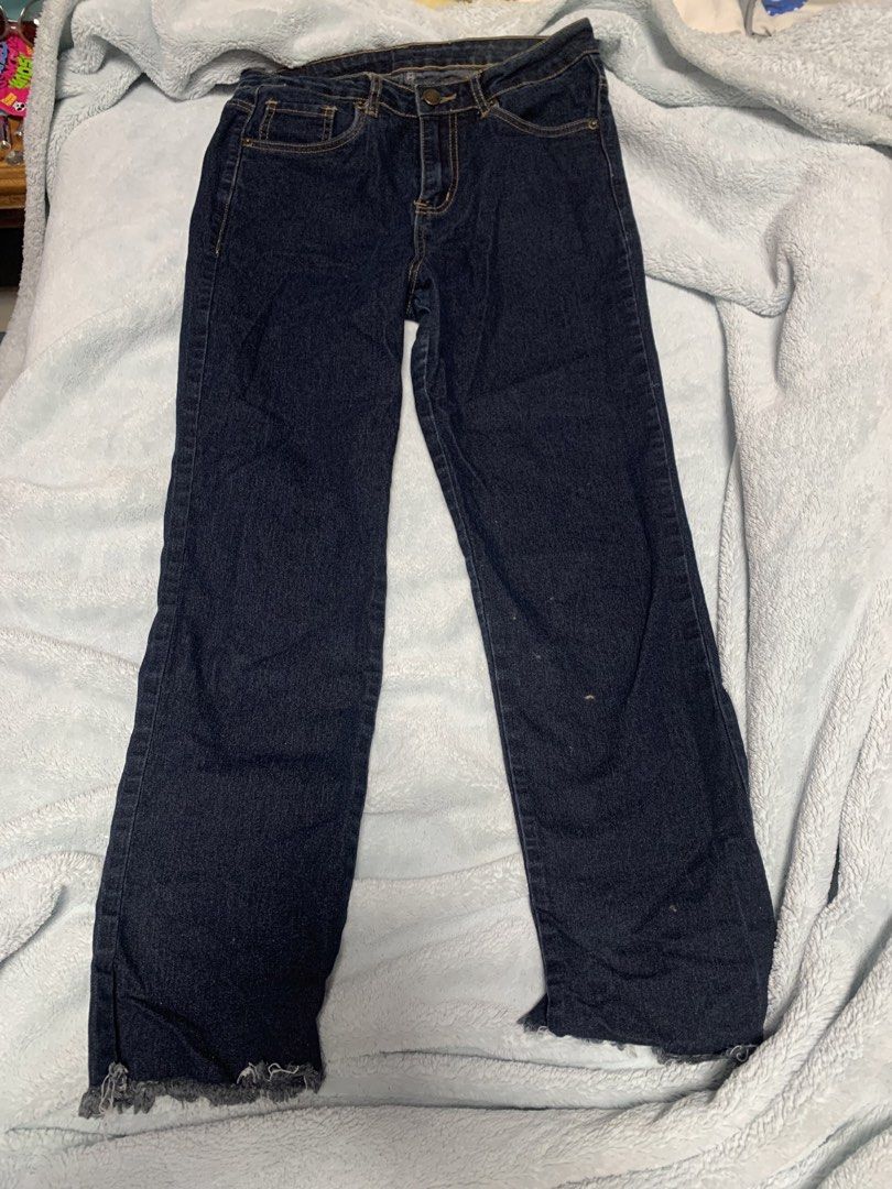 Overhauled Dark Wash Denim Jeans (Category: Jeans) located in Manila. Submitted by yenna88 (Listing ID 1443671131, Image 1). Description: - Style: Dark wash denim jeans - Feature: Raw hem detail - Condition: Light marks on leg (please check photos) - Occasion: Perfect for casual wear - not sure about size.