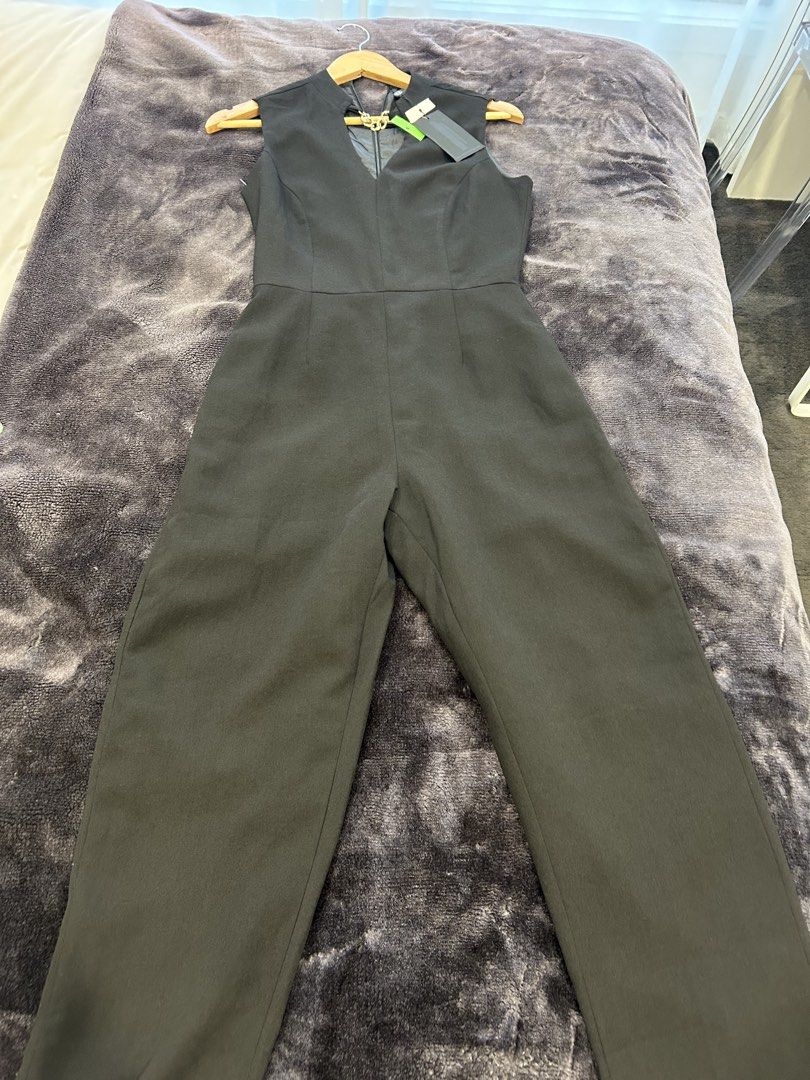 Party jumpsuit (Category: Women's Clothes) located in Dandenong. Submitted by msjoya (Listing ID 1443536191, Image 2). Description: Cute one piece. Great for parties. Unworn, tag is still on. .