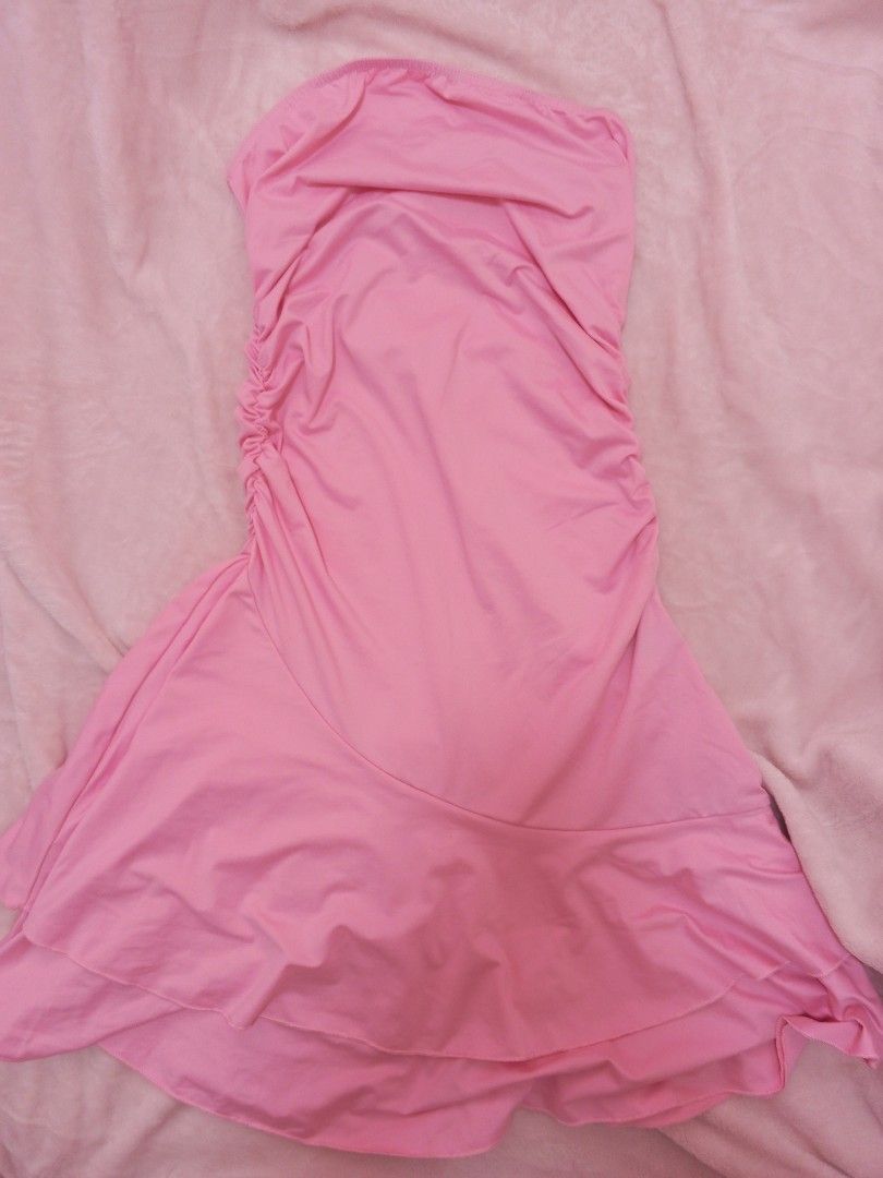 Pink Strapless Ruched Dress with Ruffle Hem (Category: Dresses) located in Manila. Submitted by aly_chy (Listing ID 1443548501, Image 1). Description: - Adorable pink strapless dress - Features stylish ruching detail on the side - Layered ruffle effect at the hem for a playful look - Made from soft and stretchy fabric for ultimate comfort - Versatile: great for casual days or parties - Easy to wear and very comfortable.