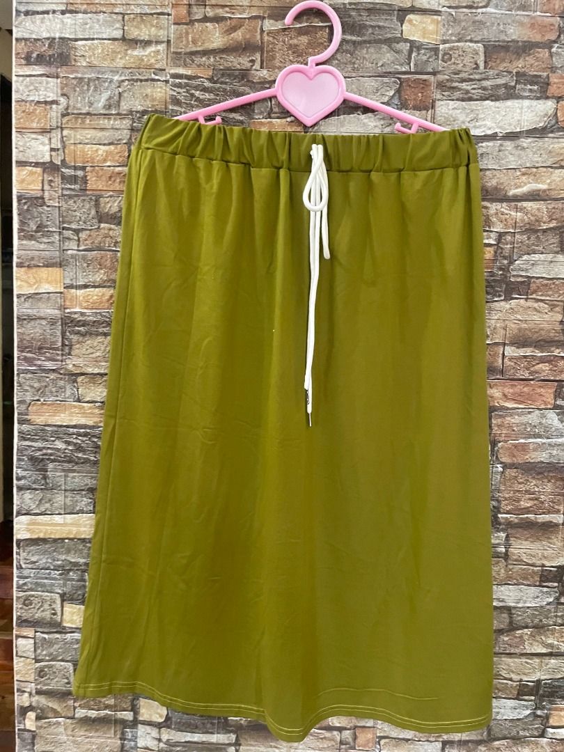Plus Size Shein Olive Green Long Skirt (Category: Skirts) located in Pagbilao. Submitted by haveyoumettesa (Listing ID 1443671347, Image 2). Description: - Olive green long skirt - Brand: Shein - Features elastic waistband with drawstring - Size: Fits XL to 1XL - Condition: Brand new, never worn - Perfect for casual wear.