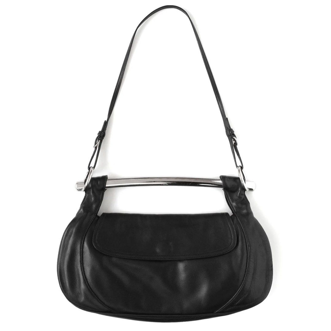 Prada Black Leather Swing Bag SS2003 with Silver Handle (Category: Luxury Bags & Wallets) located in Cebu City. Submitted by fashunkillaa (Listing ID 1443666123, Image 2). Description: Waiting for my package to arrive. Putting it on sale here before I change my mind lol. This is a really classic one. I hope I don’t regret selling this. - Authentic Prada black leather shoulder bag - Features a sleek silver metal handle - Made from soft, draping le