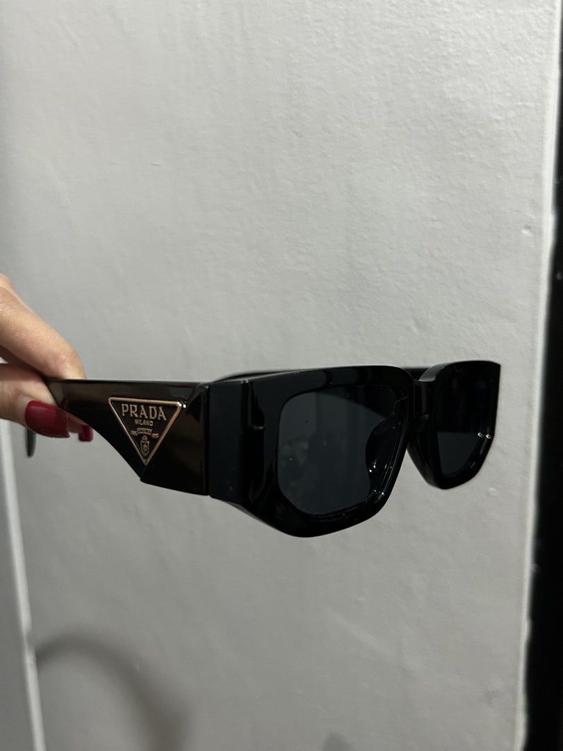 Prada Black Rectangular Sunglasses (Category: Sunglasses & Eyewear) located in Quezon City. Submitted by mypreloveditems88 (Listing ID 1443597969, Image 1). Description: - Prada Sunglasses - Black - Lovely structure - No inclusions - SF c/o buyer.