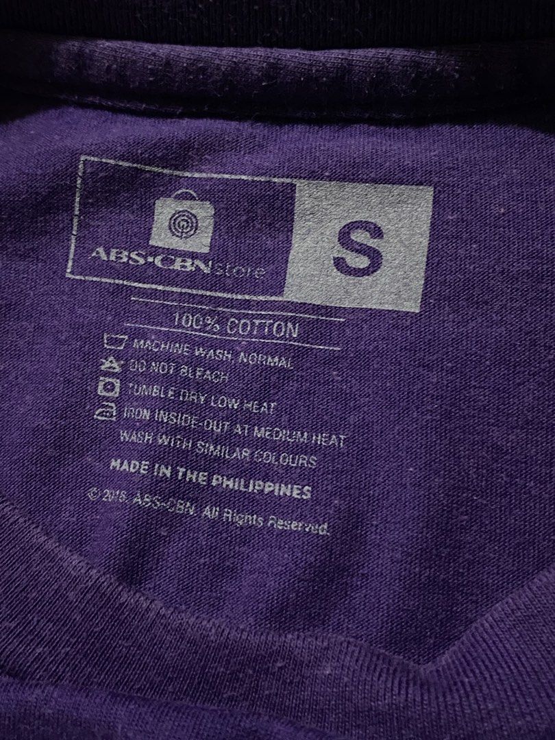 Purple Fish Graphic Shirt (Category: Shirts) located in Quezon City. Submitted by naruiii (Listing ID 1443632135, Image 3). Description: Length: 25in Width: 17in Size: S in tag.