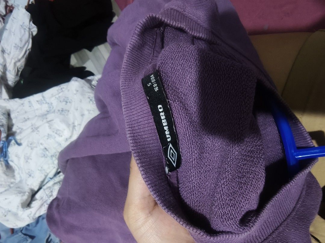 Purple Umbro Crewneck Sweatshirt (Category: Babies & Kids Fashion) located in San Juan City. Submitted by rednitch (Listing ID 1443553325, Image 2). Description: - Purple Umbro sweatshirt - Crewneck style with long sleeves - Printed Umbro logo on the front - Tag indicates size S (please check measurements if possible) - Ideal for everyday casual wear.