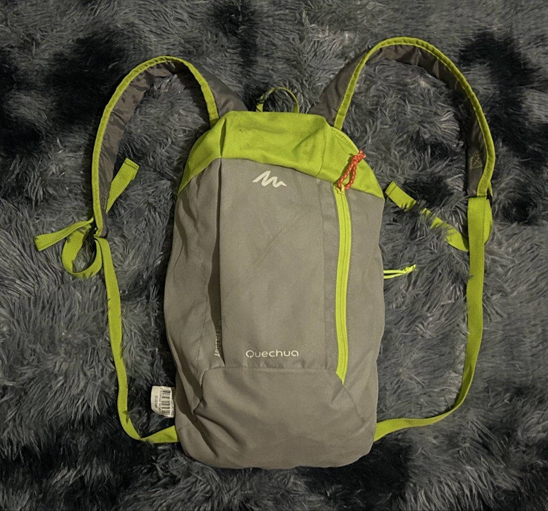 Quechua Arpenaz 10 Backpack Grey Green W10 L17 (Category: Backpacks) located in Cadiz. Submitted by jaybatiller (Listing ID 1443619663, Image 2). Description: - Lightweight Quechua Arpenaz 10 backpack - Color: Grey and bright green - Ideal for day trips and carrying essentials - Features a zipped main compartment - Adjustable straps for comfort - Folds down compactly for easy storage - In good, pre-loved condition.