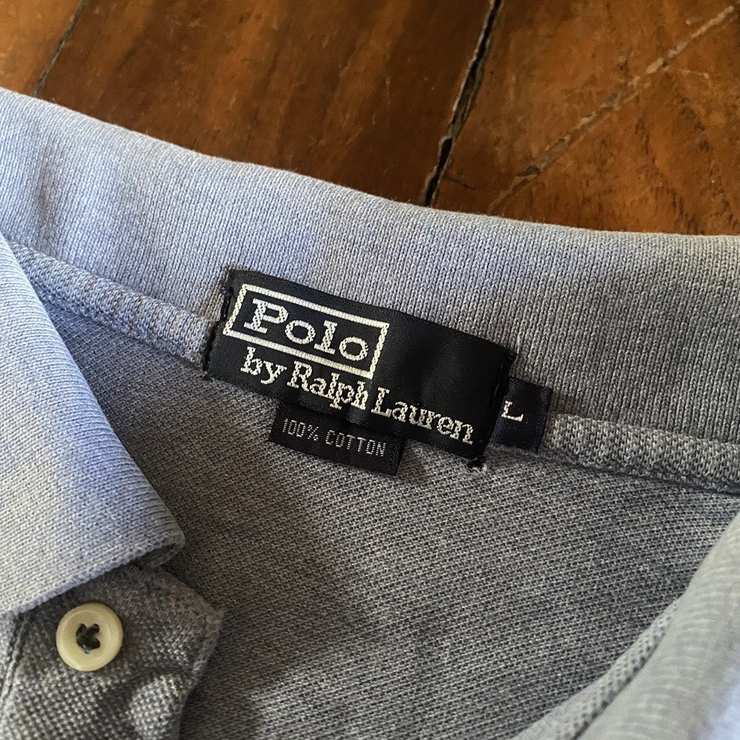 Ralph Lauren polo shirt (Category: Tshirts & Polo Shirts ) located in Naga. Submitted by decluttertingz_ (Listing ID 1443614100, Image 3). Description: RL bluish grey polo shirt Size L on tag fits S 21x25” Color rate: 9.5/10 Issue: cut wash tags .