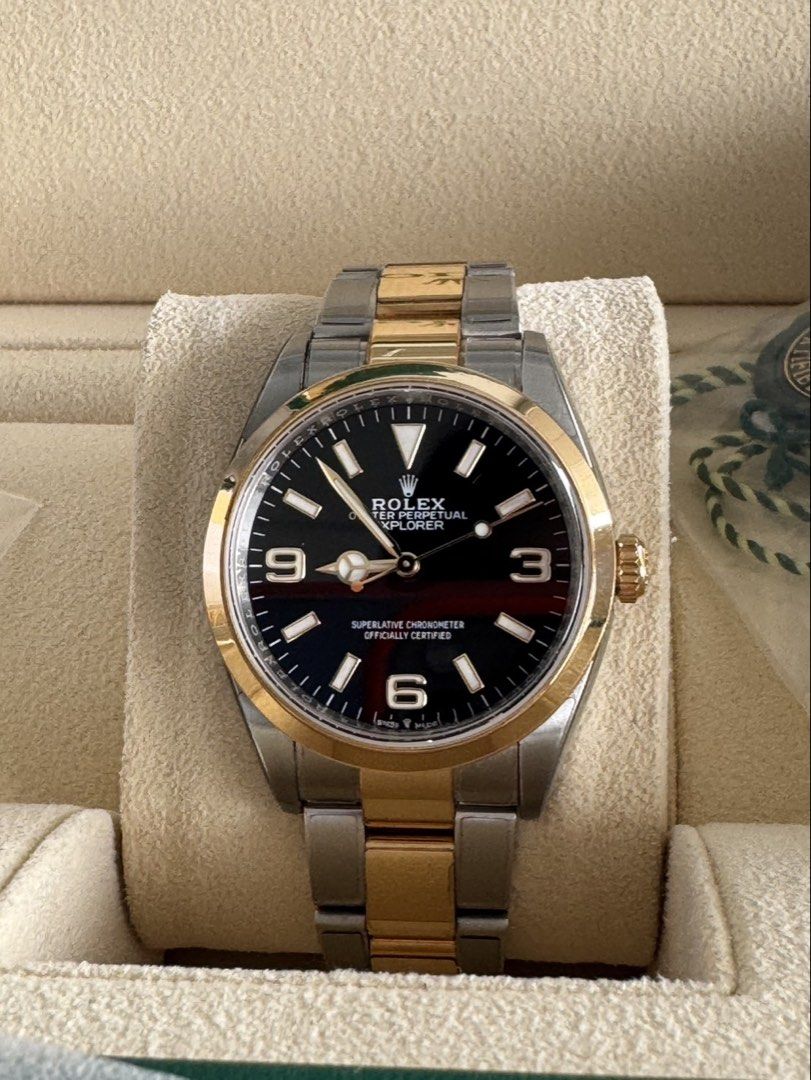 Rolex Explorer Ref. 124273 (Category: Watches) located in Singapore. Submitted by millenniumassociates (Listing ID 1443582821, Image 3). Description: Reference: 124273 Case size: 36mm Materials: Oystersteel + 18ct yellow gold Bezel: Smooth yellow gold Dial: Black with luminous baton indices; Arabic numerals at 3, 6, 9 Bracelet: Two-tone Oyster (Jubilee-style alternating steel/gold links) Movement: Calibre 3230 (in-house, automatic) Power reserve: