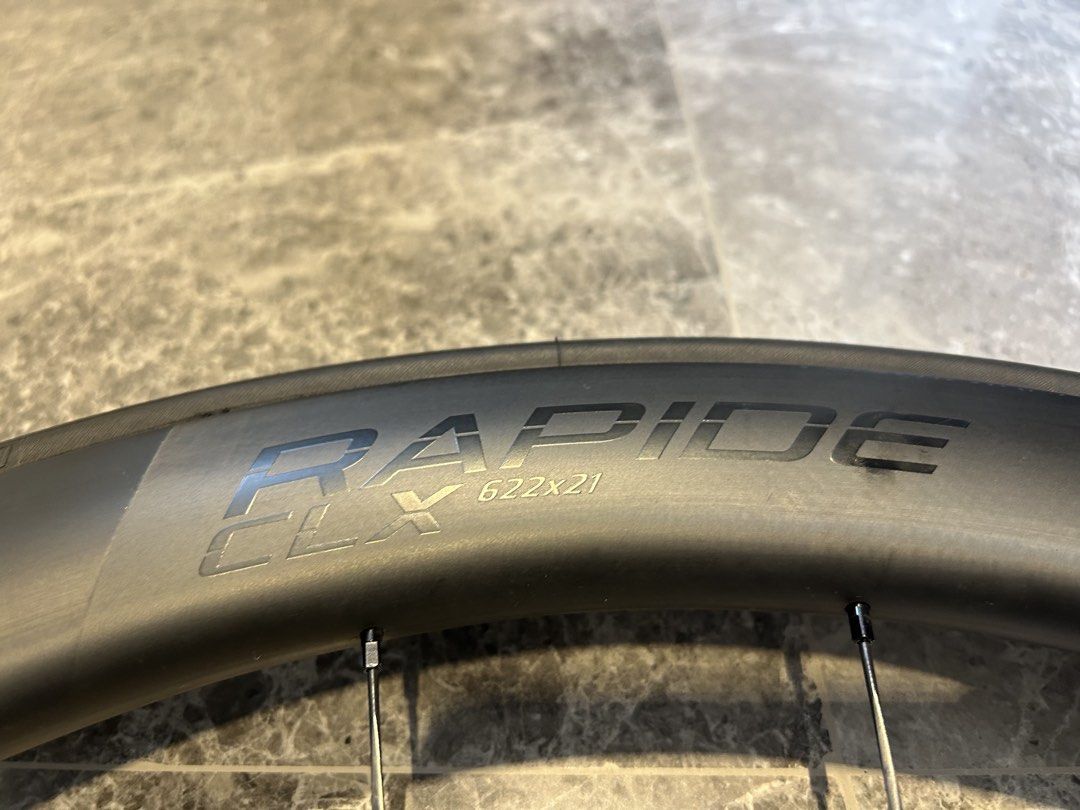 Roval Rapide CLX (CLX 1) Wheelset with Bag (Category: Parts & Accessories) located in Singapore. Submitted by suw20 (Listing ID 1443576856, Image 3). Description: - Rim material: carbon - Rim depth & width: - Front: 51mm deep, 35mm wide - Rear: 60mm deep, 30mm wide - Weight: 1400g (Front: 649g, Rear: 751g) - Braking: Disc Brake Only (Center Lock) - Tire compatibility: Clincher (tube-type) only - Size: 622x21 - Hub & Bearings: Built with Roval’s A