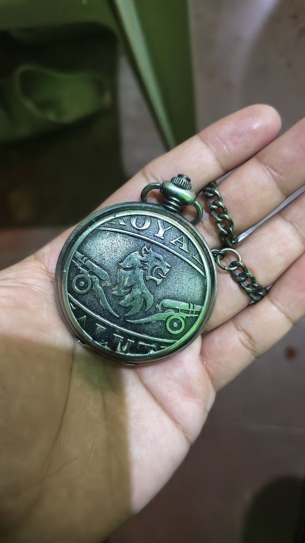 Royal Salute Pocket Watch with Chain (Category: Luxury Watches) located in Manila. Submitted by don.suriuq20 (Listing ID 1443569657, Image 2). Description: - Vintage-style pocket watch - Features a lion emblem on the front cover - Back engraved with 'Royal Salute Scotch Whisky' - Comes with a metal chain - Ideal for collectors or as a unique accessory.