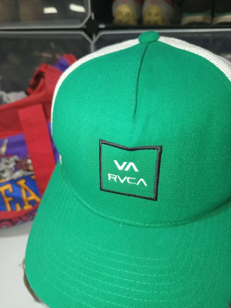 RVCA Green White Trucker Cap OSFA (Category: Caps & Hats) located in Calamba. Submitted by indiecated.thriftnshop (Listing ID 1443568157, Image 3). Description: - Green and white RVCA trucker cap - Iconic RVCA logo on the front - Breathable mesh back for comfort - Adjustable snapback closure for a perfect fit - One size fits all - Ideal for casual and everyday wear.