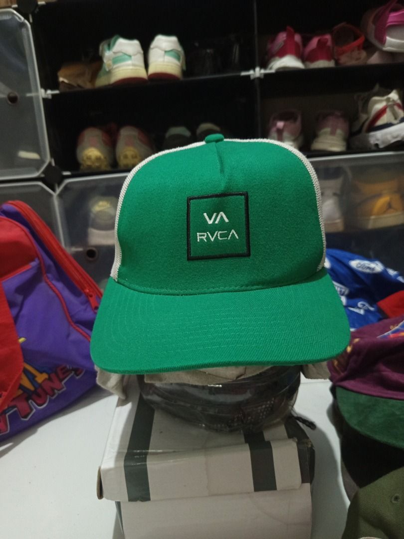 RVCA Green White Trucker Cap OSFA (Category: Caps & Hats) located in Calamba. Submitted by indiecated.thriftnshop (Listing ID 1443568157, Image 2). Description: - Green and white RVCA trucker cap - Iconic RVCA logo on the front - Breathable mesh back for comfort - Adjustable snapback closure for a perfect fit - One size fits all - Ideal for casual and everyday wear.