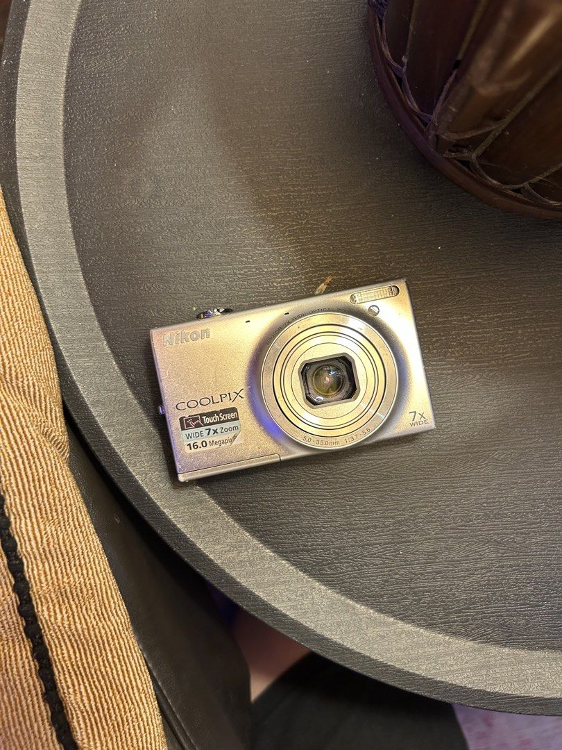SALE Nikon Coolpix S6100 digicam digital camera (Category: Cameras) located in Lagonoy. Submitted by nadayojiii (Listing ID 1443554343, Image 1). Description: Nikon Coolpix S6100✨ NO FUNCTIONAL ISSUES all working zoom working flash working has lcd flaws(output not affected) no lens curtain(performance not affected) TOUCH SCREEN✨ SUPER CRISP SHOTS🌅✨ COMPLETE SET Inclusions: unit battery charger sd card strap stickers.