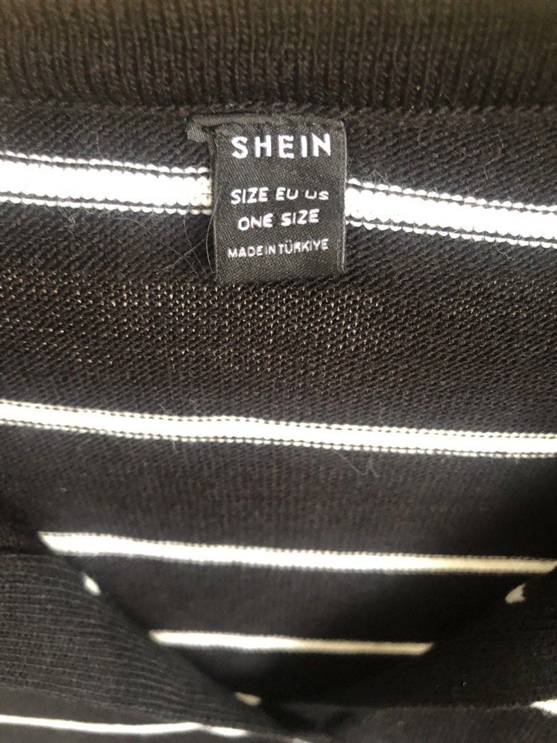 SHEIN Black and White Striped Collared Sweater - One Size (Category: Longsleeves) located in Manila. Submitted by rshay (Listing ID 1443519237, Image 2). Description: - Black and white striped sweater - Brand: SHEIN - Size: One Size Fits All - Features: Collared neckline with V-cut, Long sleeves - Origin: Made in Turkey - Styling: Easy to pair with jeans or skirts.