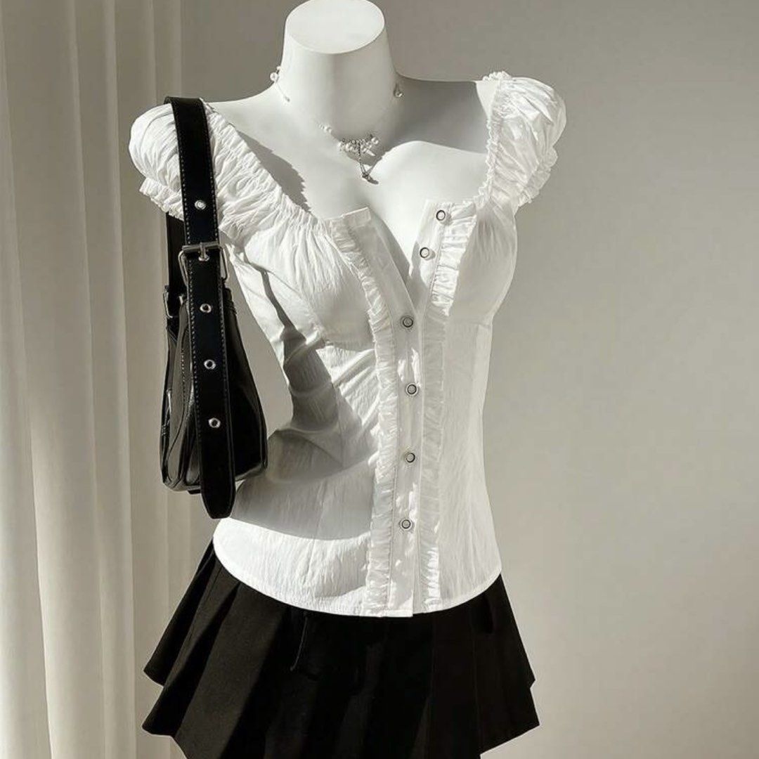 SHEIN Puff Sleeves White Corset Top (Category: Blouses) located in Quezon City. Submitted by oddatellier (Listing ID 1443524258, Image 1). Description: .