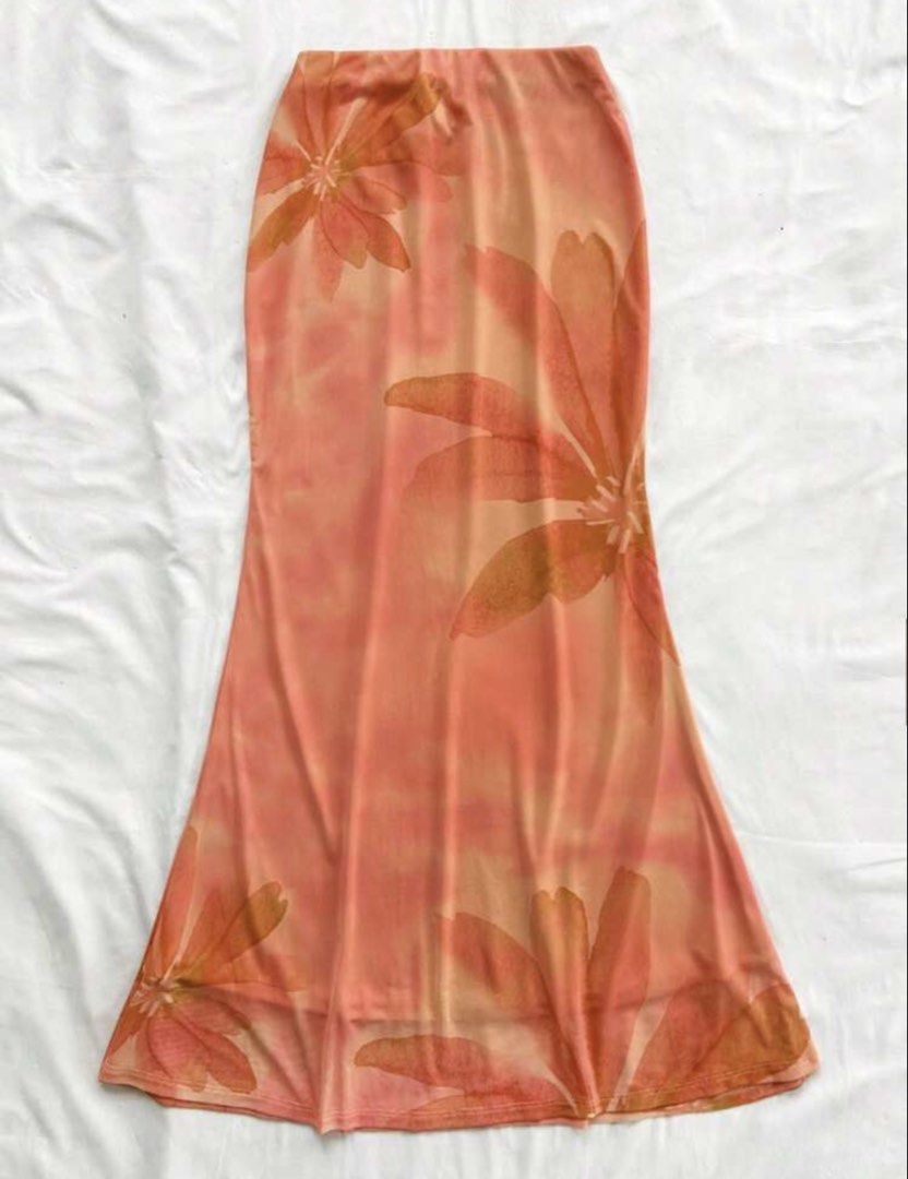 SHE!N Orange Beach Summer Skirt (Category: Skirts) located in Quezon City. Submitted by ree_.declutters (Listing ID 1443602380, Image 1). Description: Only worn once in ELYU trip Hugs my body so good and very pretty color! What you see is what you get Original price: ₱499 Selling price: ₱250.
