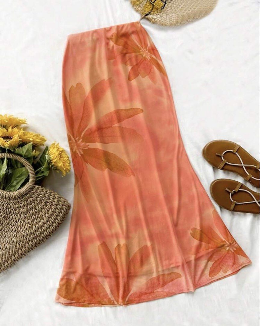 SHE!N Orange Beach Summer Skirt (Category: Skirts) located in Quezon City. Submitted by ree_.declutters (Listing ID 1443602380, Image 2). Description: Only worn once in ELYU trip Hugs my body so good and very pretty color! What you see is what you get Original price: ₱499 Selling price: ₱250.